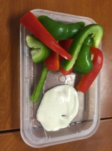 Bell pepper slices with ranch dressing