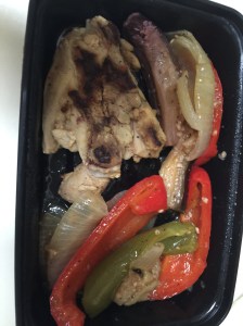 grilled chicken breast with sliced bell peppers, onions, and eggplant